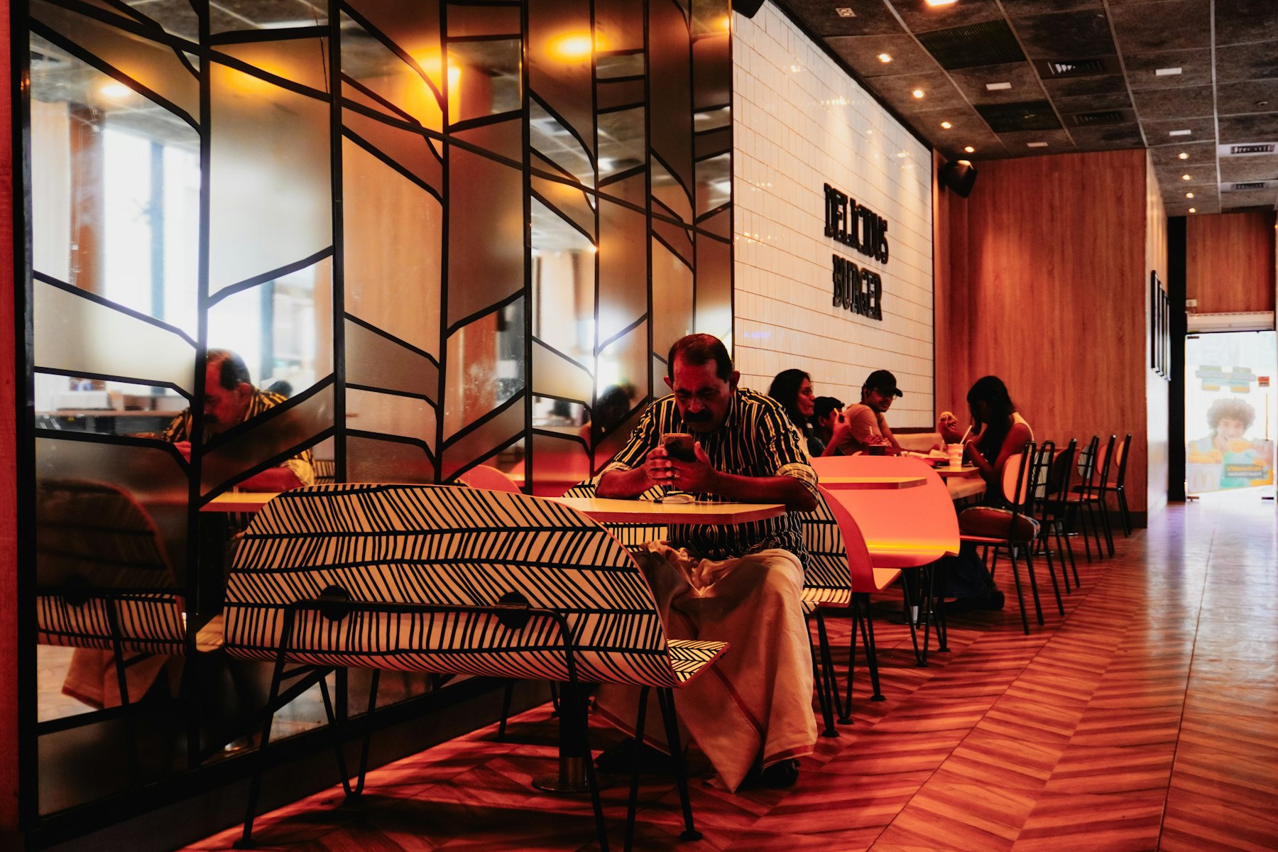 People dining, restaurant service counter and café atmosphere